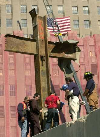 Steel beams in the form of the Cross of Christ created during the collapse of one of the World Trade Center buildings